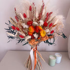 pampas grass bouquet in burnt orange, deep green and cream shades