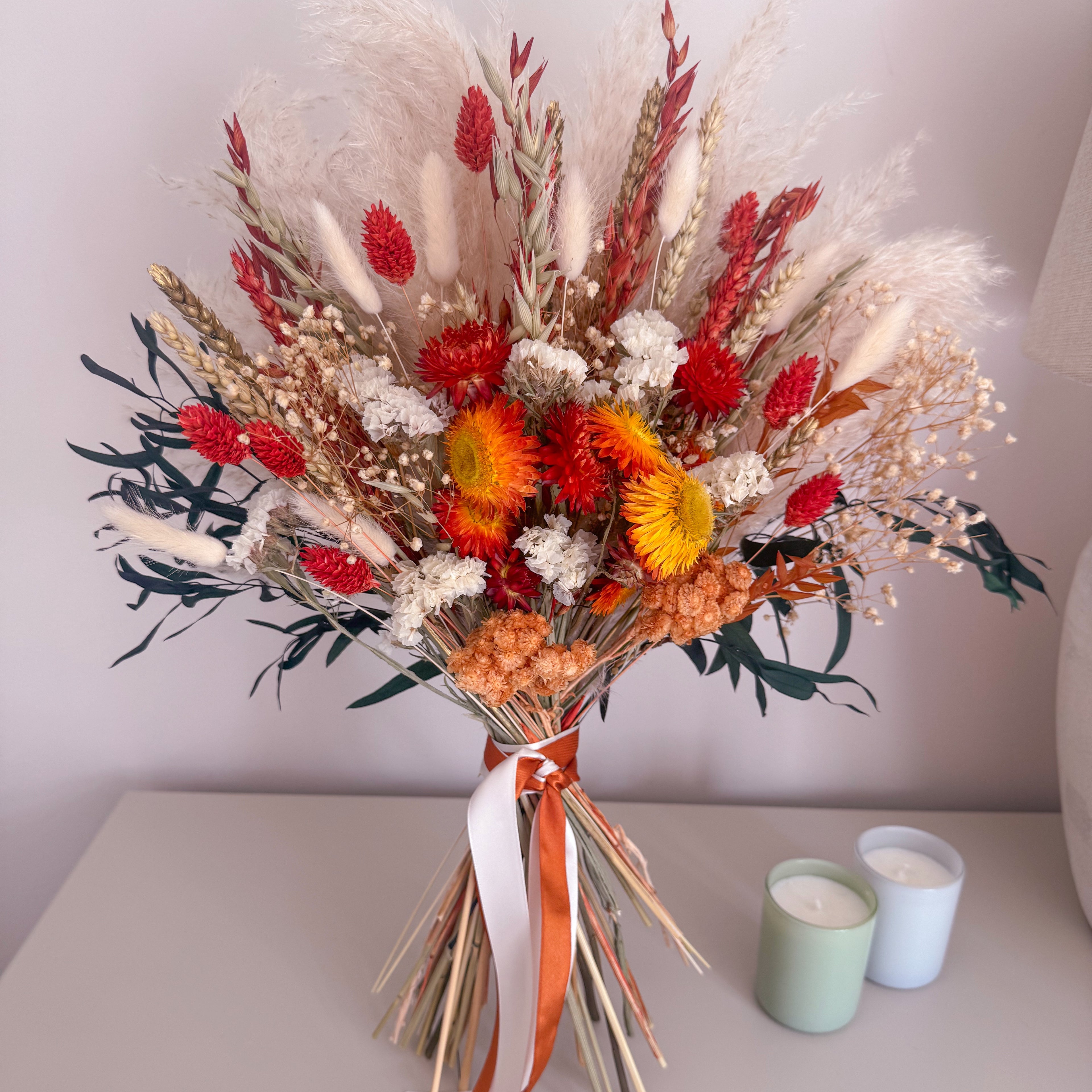 pampas grass bouquet in burnt orange, deep green and cream shades