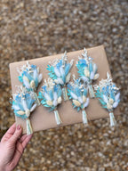 blue and white grooms boutonniere