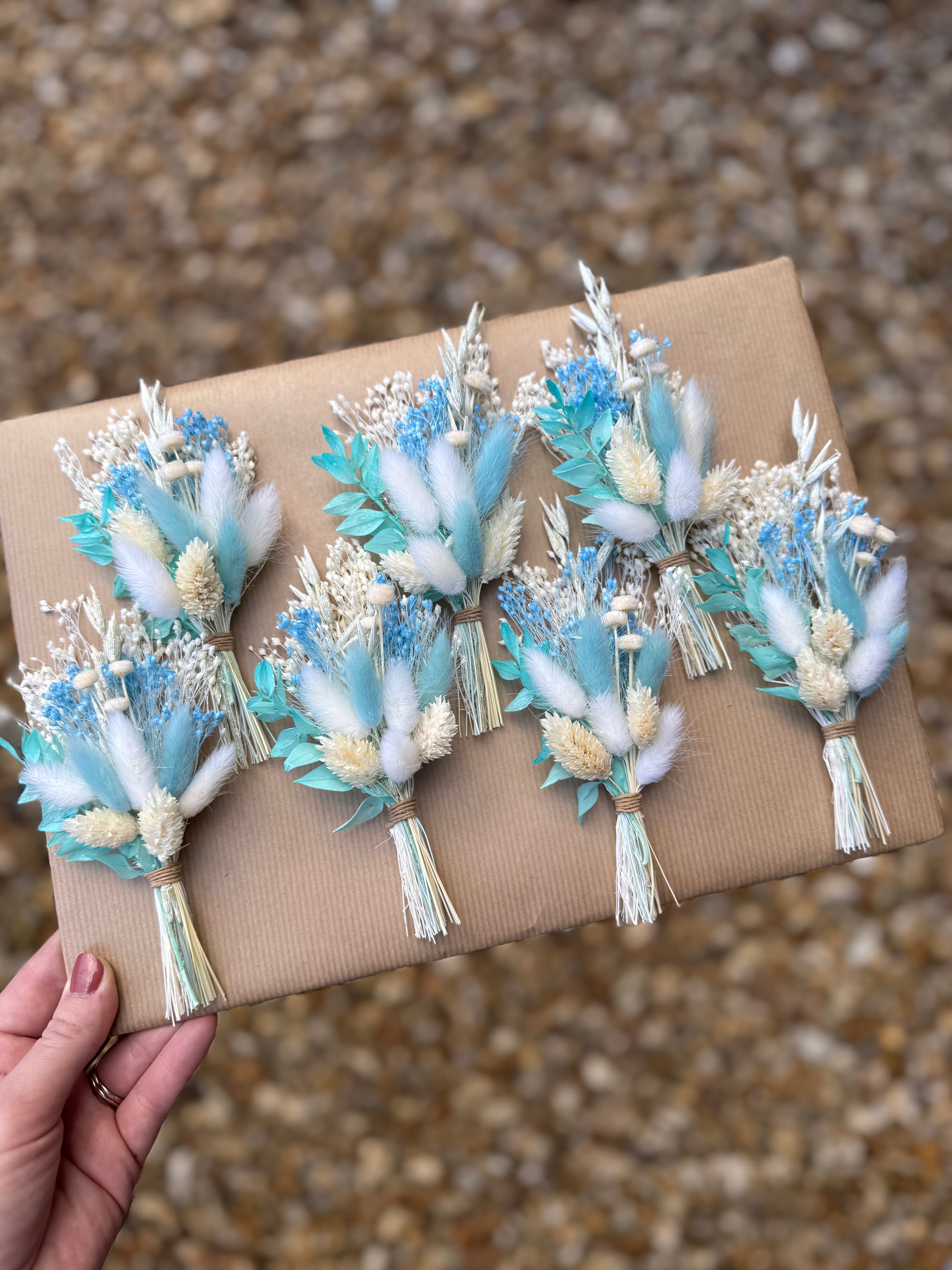 light blue buttonhole for wedding