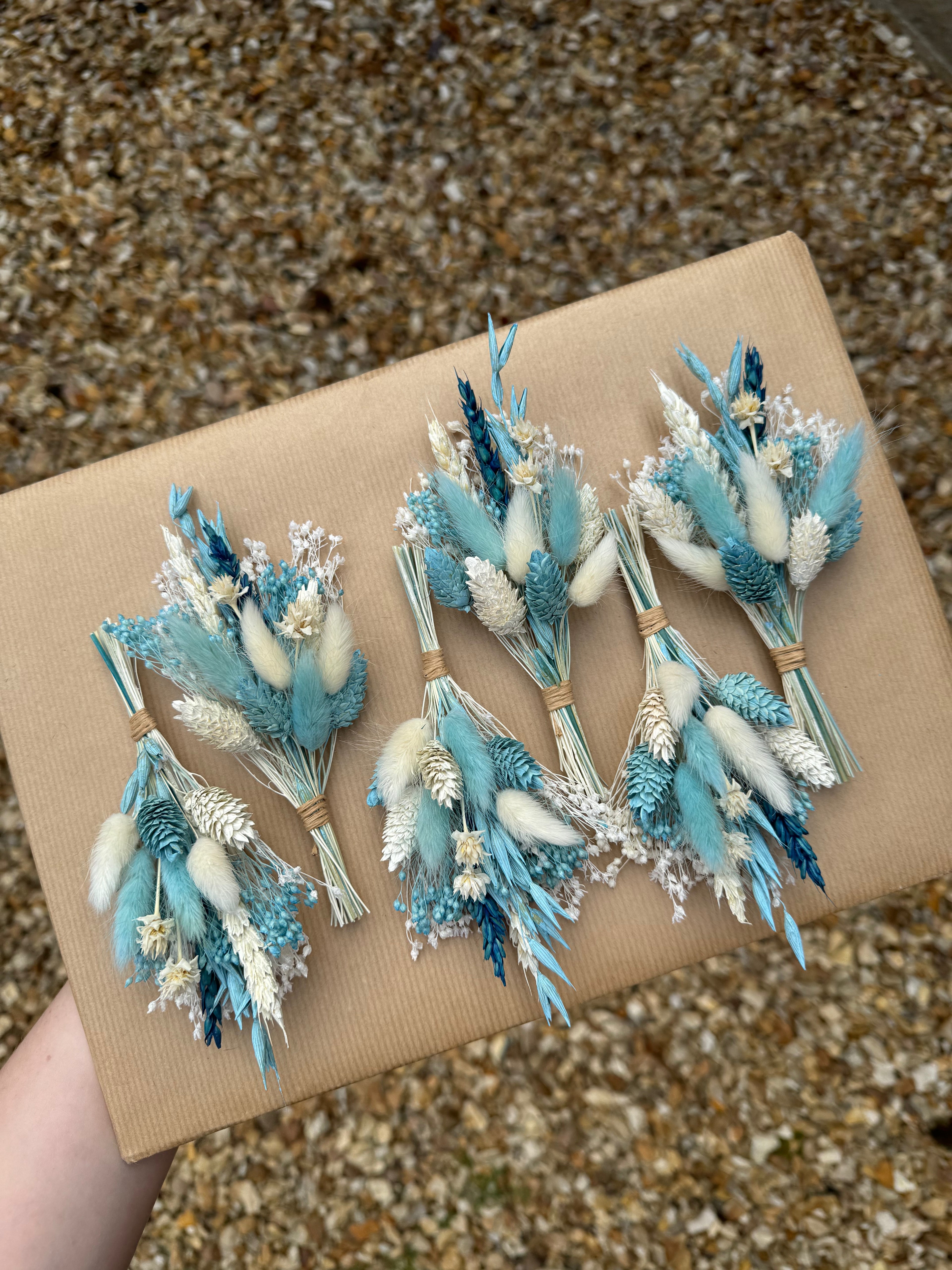 pastel blue dried flower buttonhole