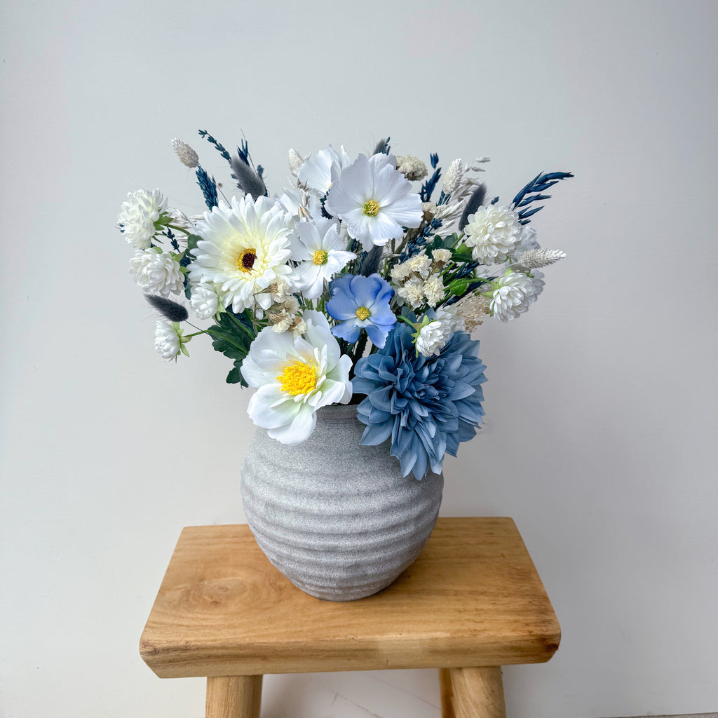 dusty blue faux bouquet with white artificial florals