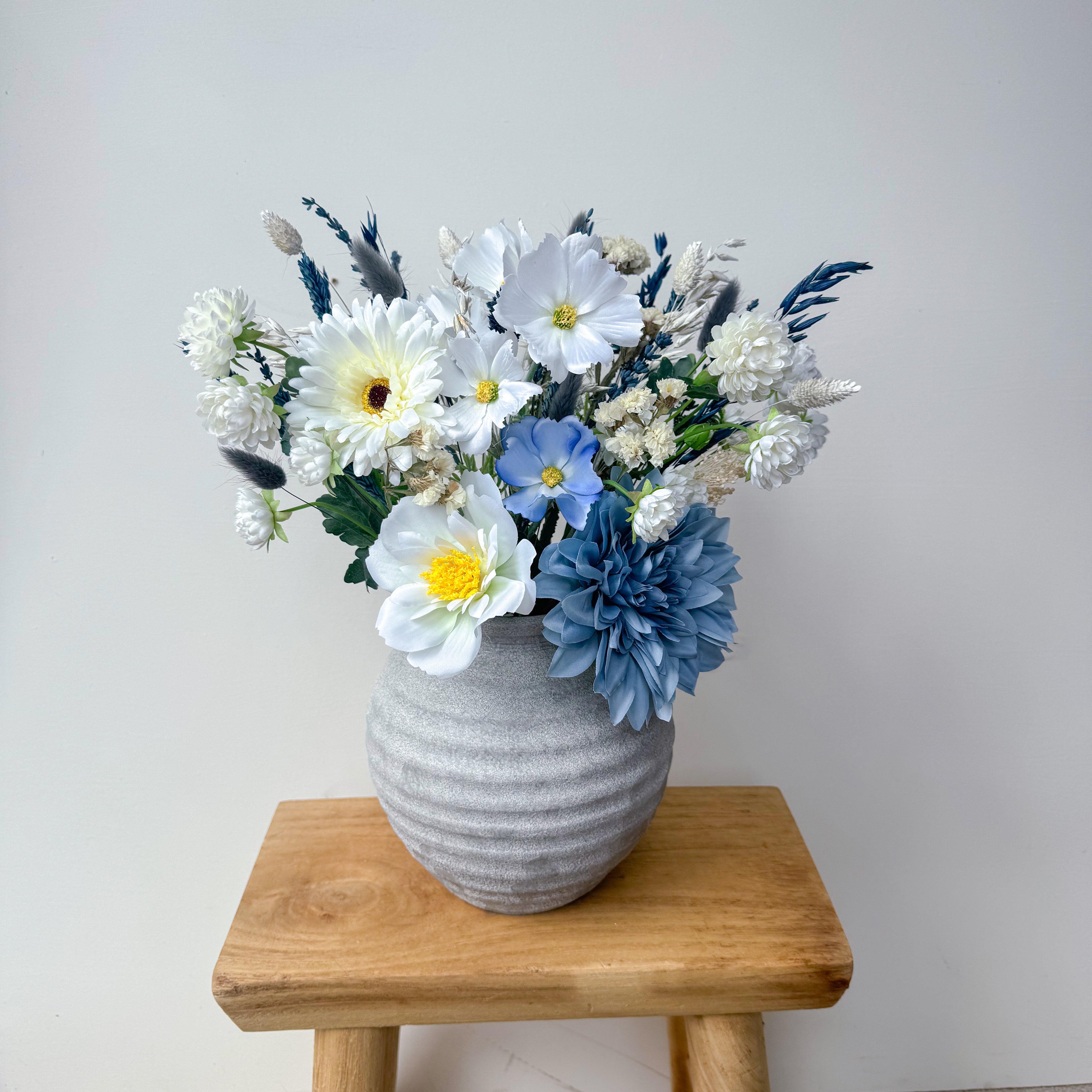 dusty blue faux bouquet with white artificial florals