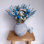 blue and white dried daisy bouquet