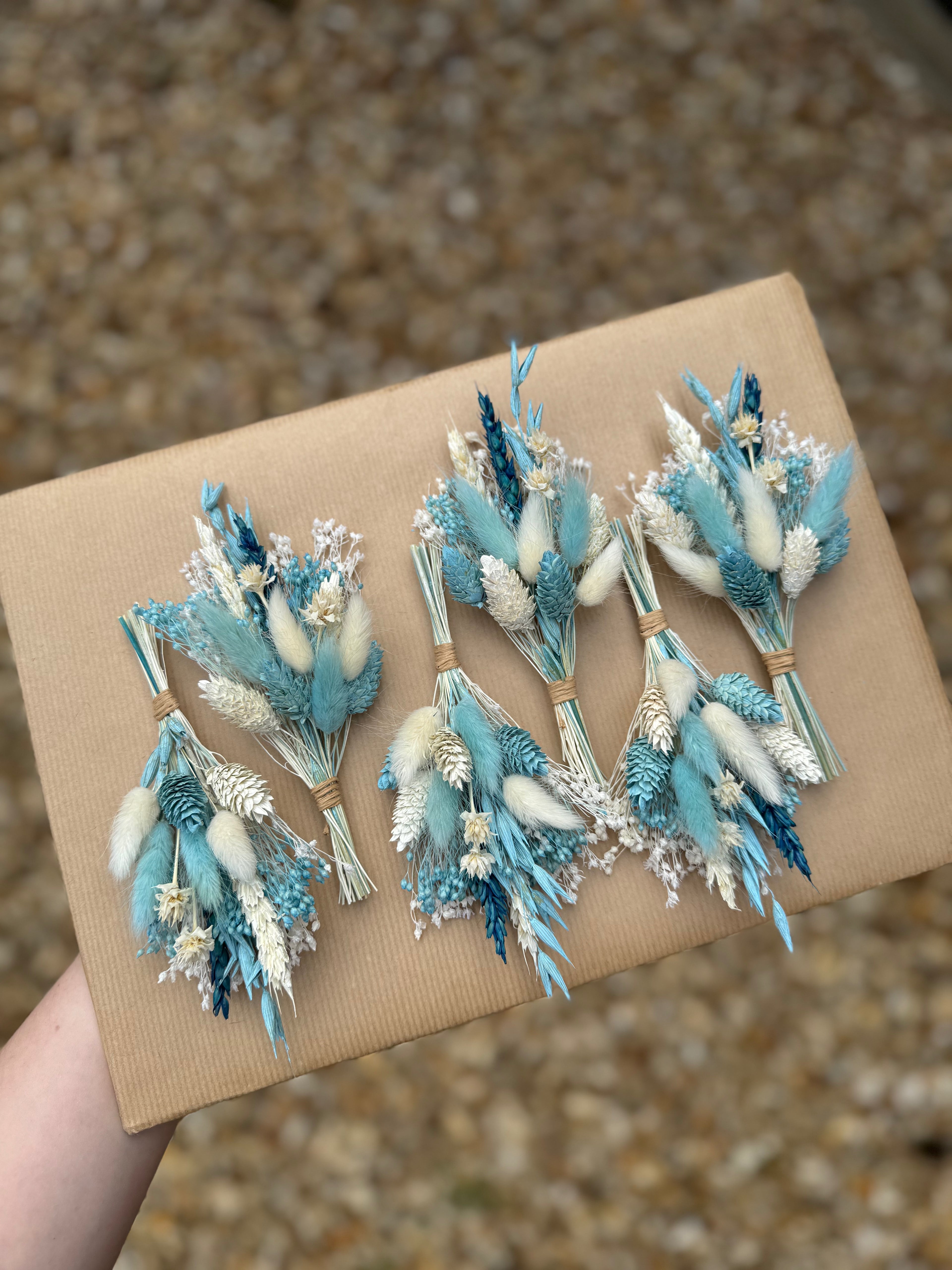 light blue and white boutonniere