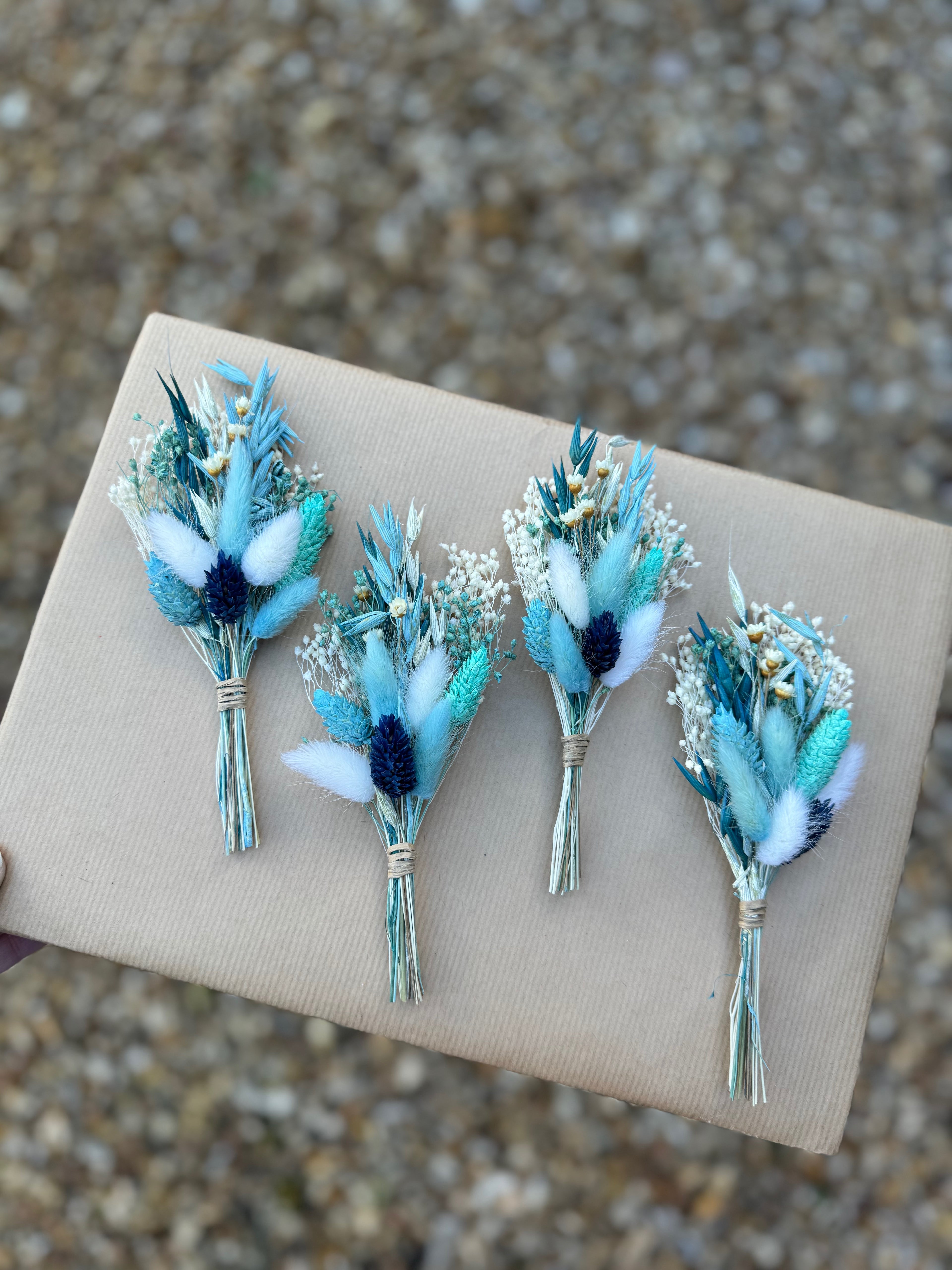 blue and white dried flower buttonhole for weddings
