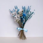 small blue dried flower bunch with blue bunny tails