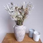 white dried flower bunch with daisies