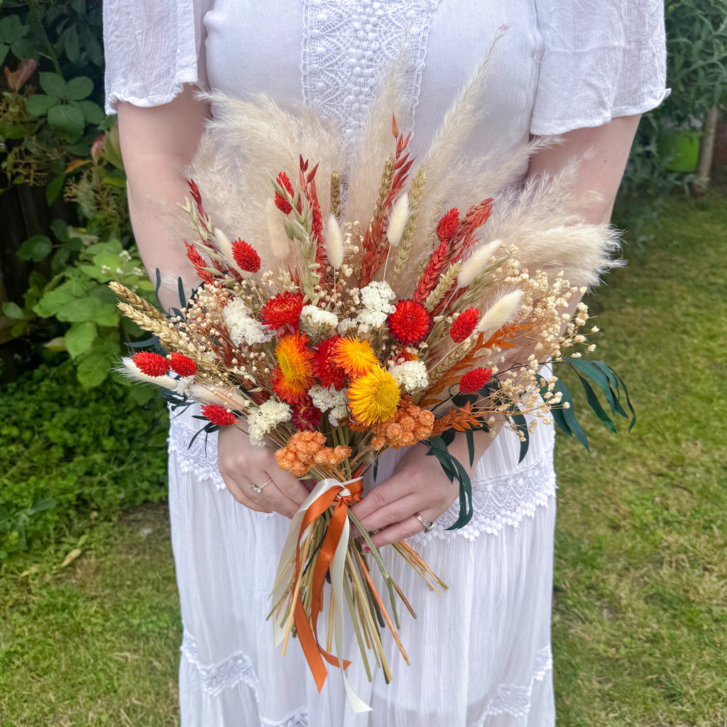 burnt orange helichrysum pampas grass bouquet