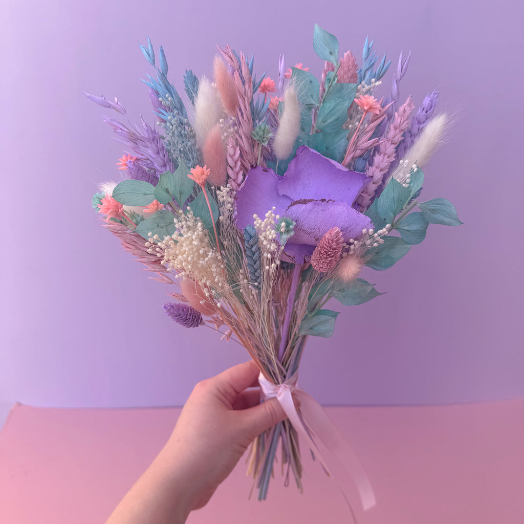 colourful pastel dried flower bunch with palm cap