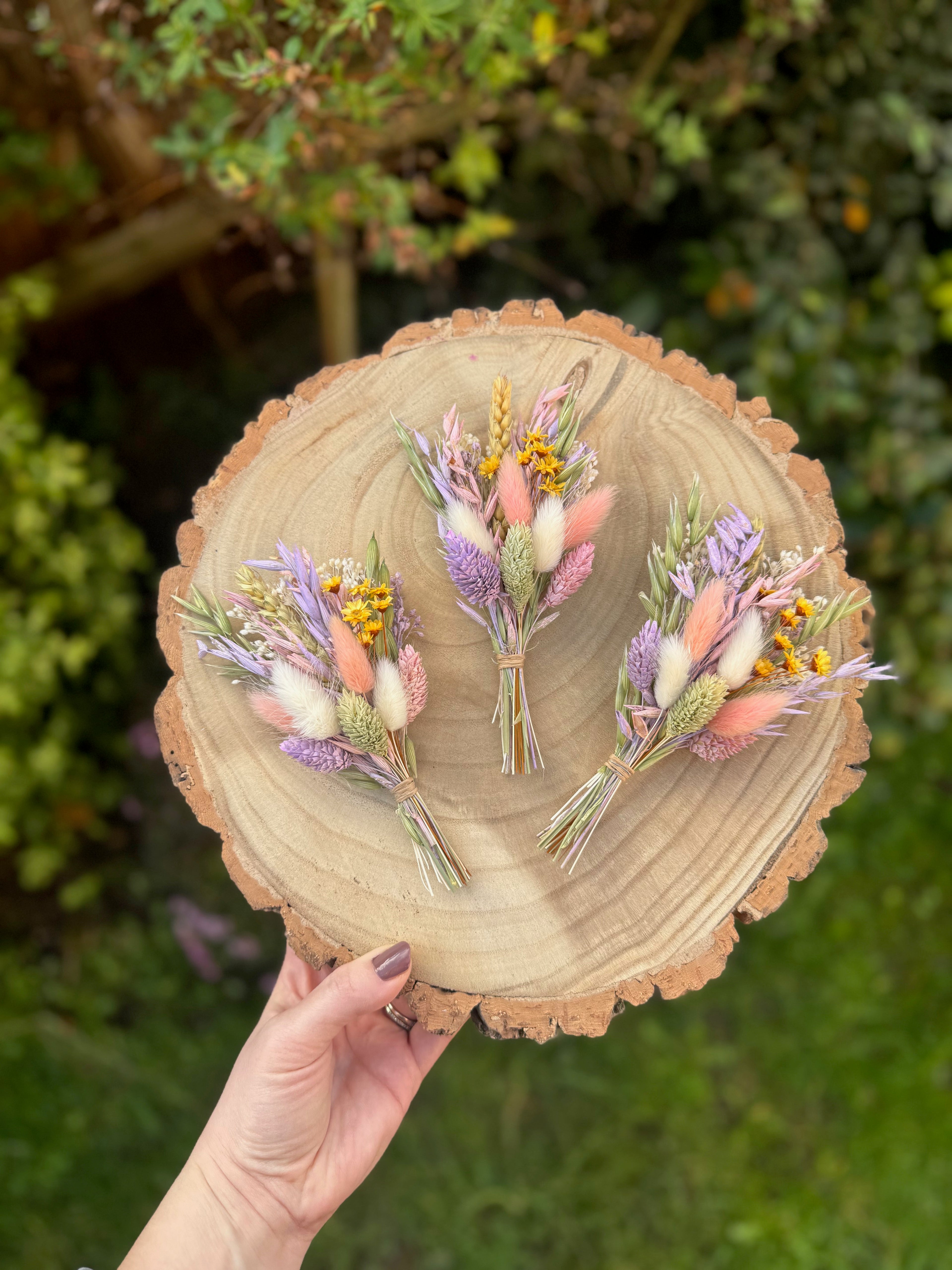 floral wedding pin in green, purple and pink colours