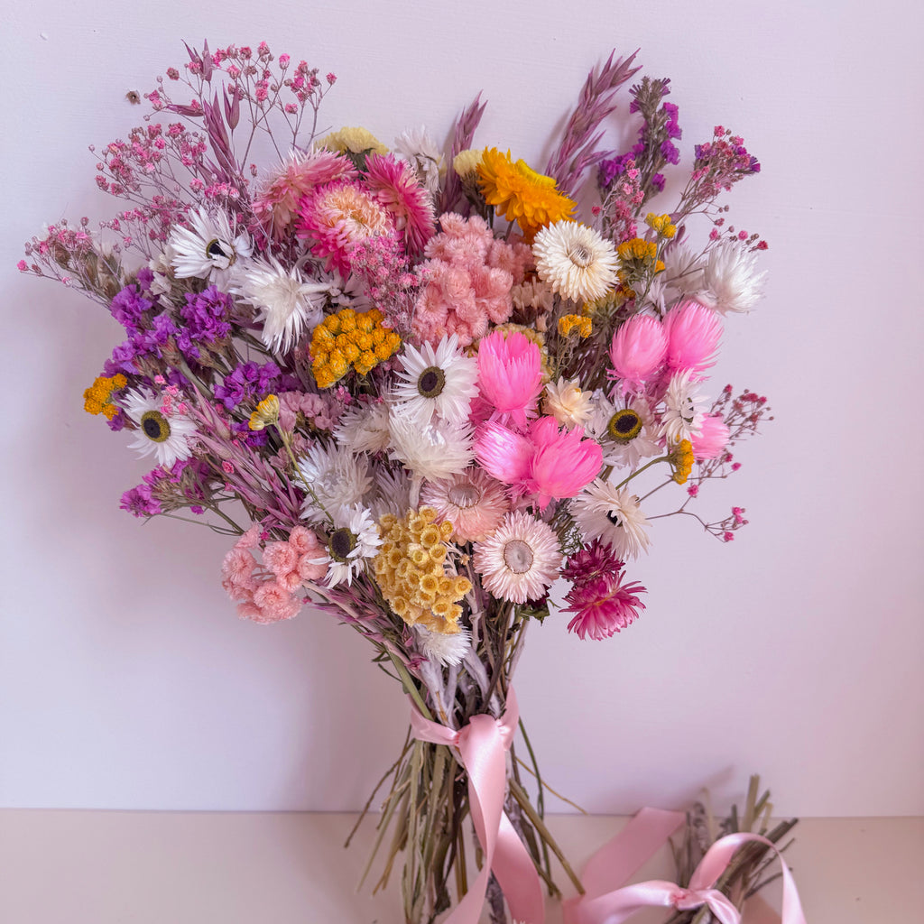 colourful pastel dried flowers with daisies