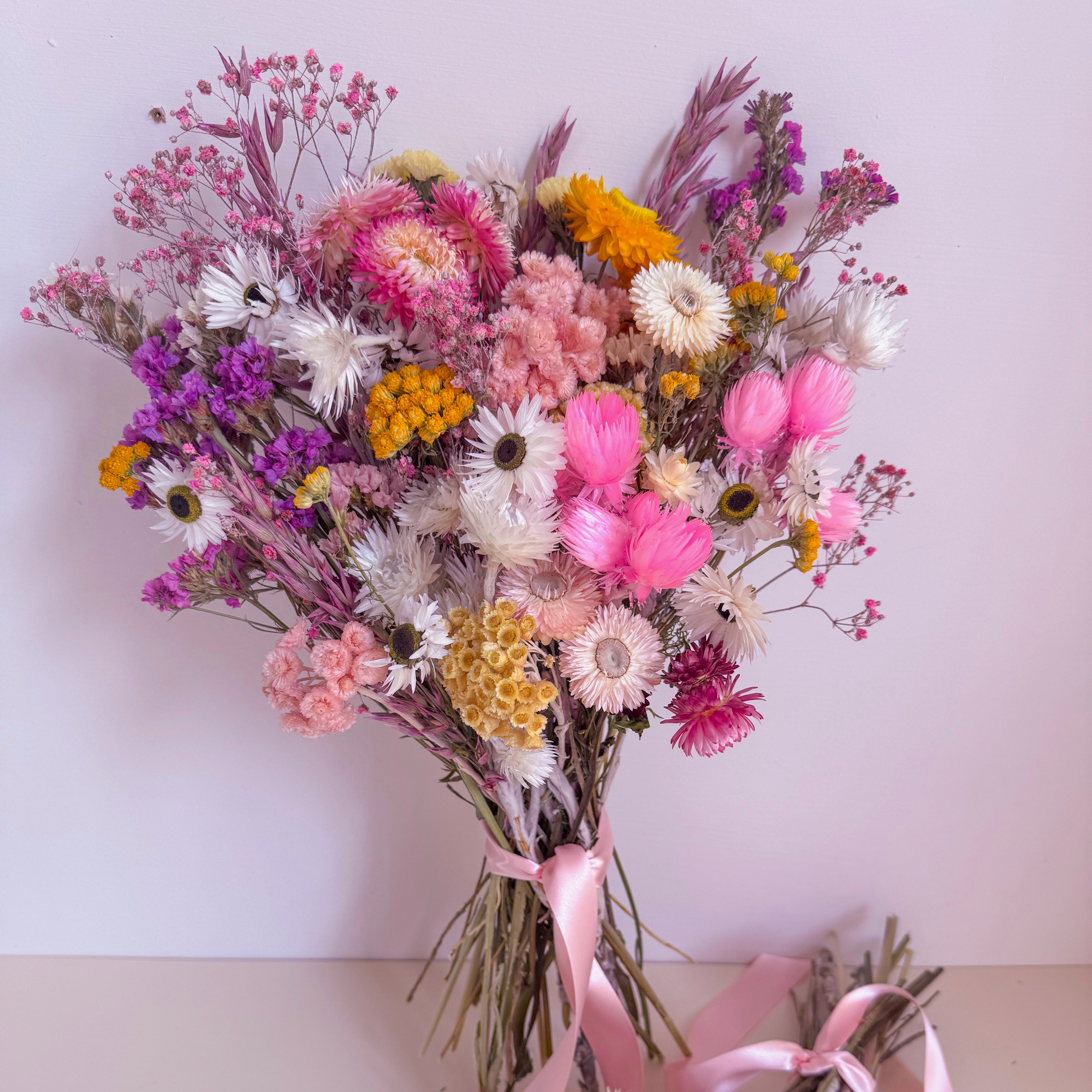 colourful pastel dried flowers with daisies