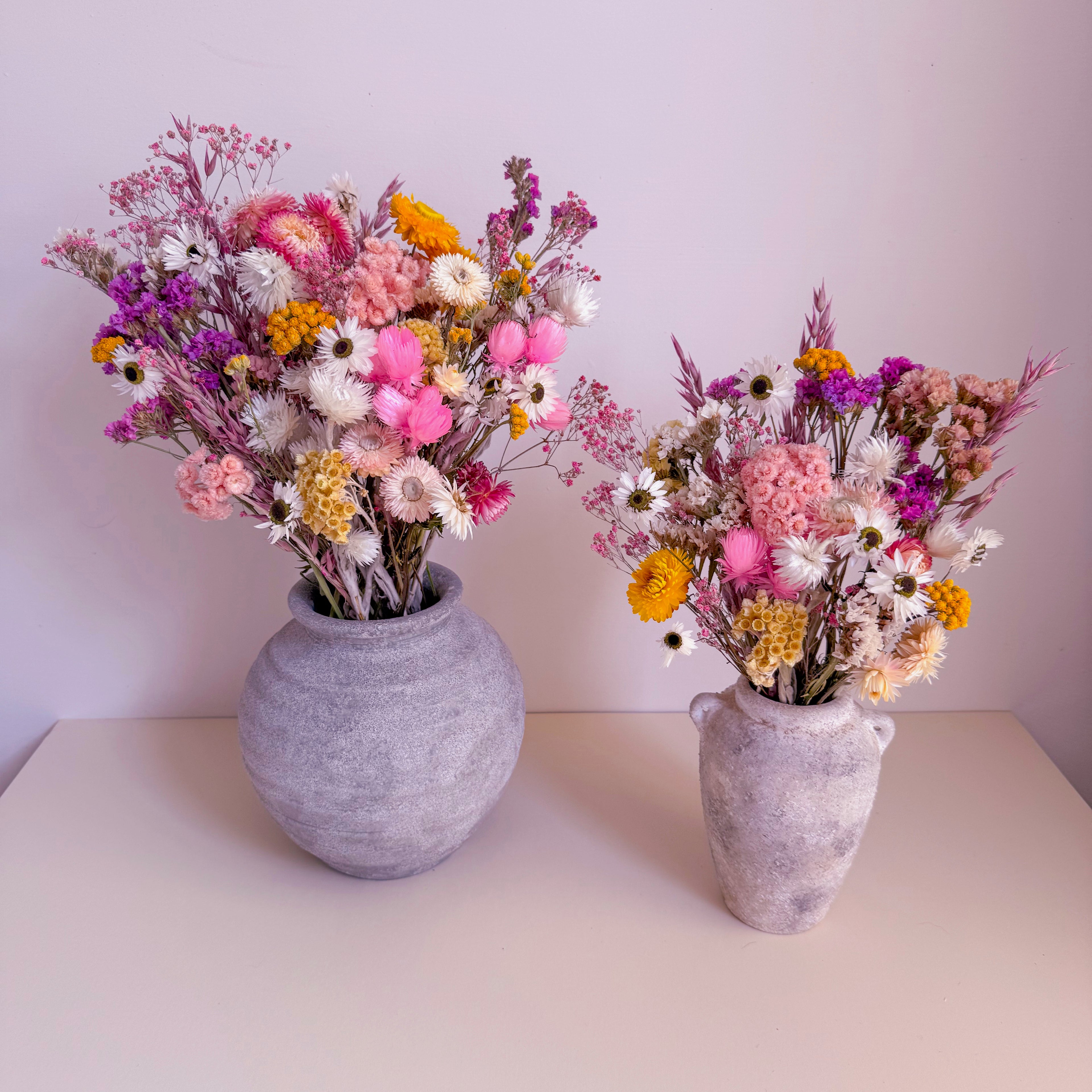 pink and yellow dried flower arrangement