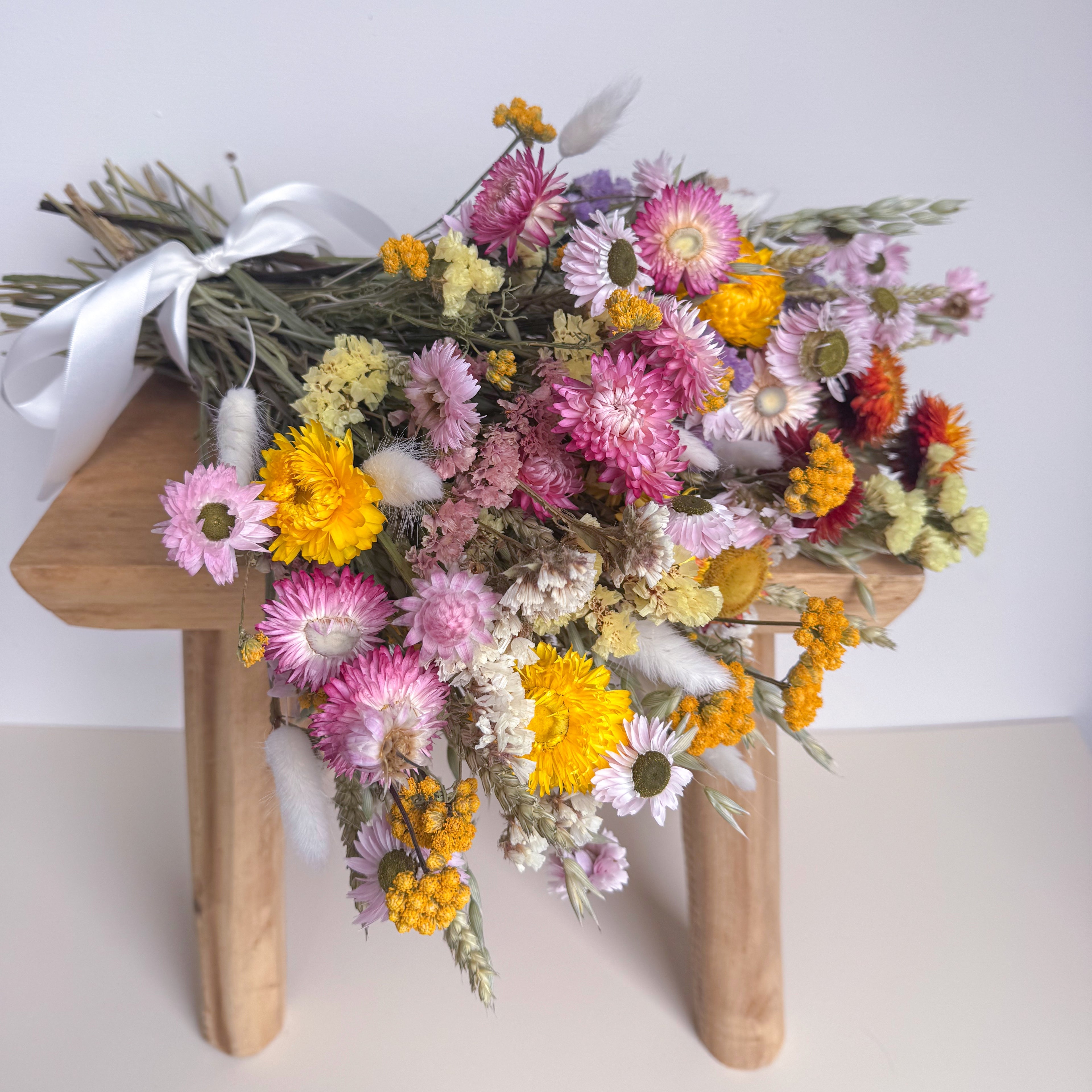 yellow, pink and green dried wildflower bouquet