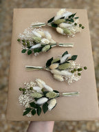 dark green boutonniere for groom