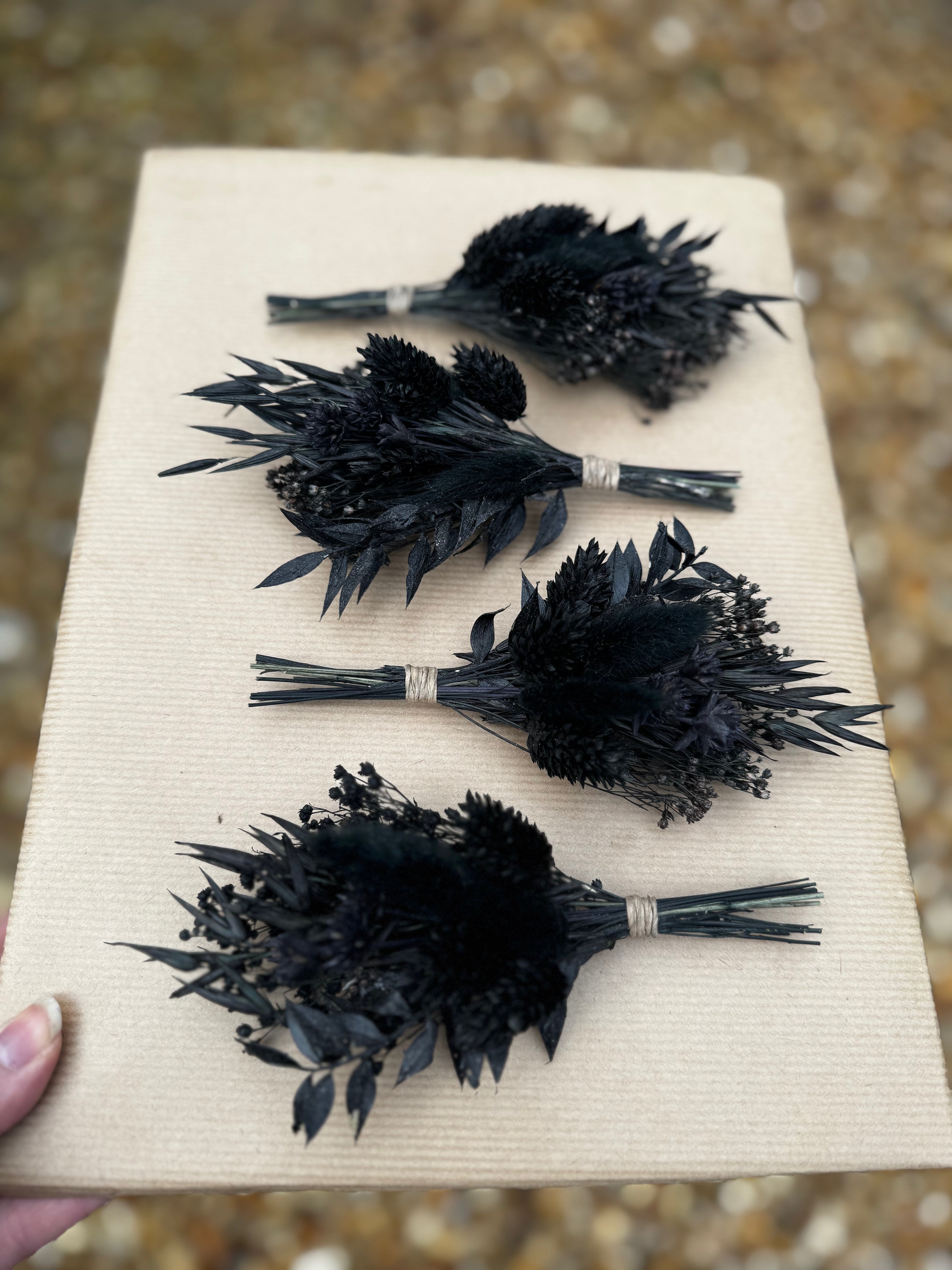 black floral buttonhole for wedding