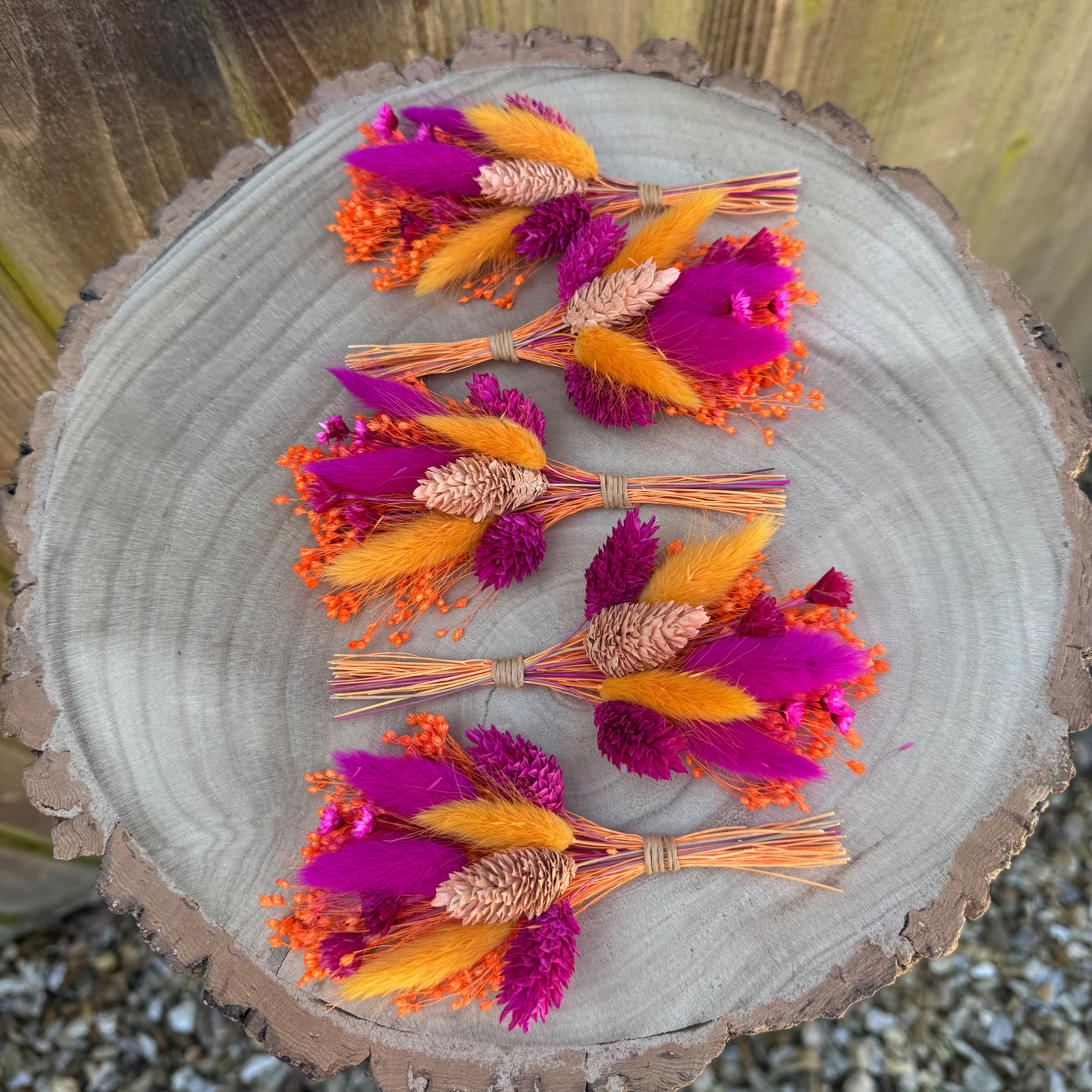 cerise pink and bright orange dry floral grooms pin