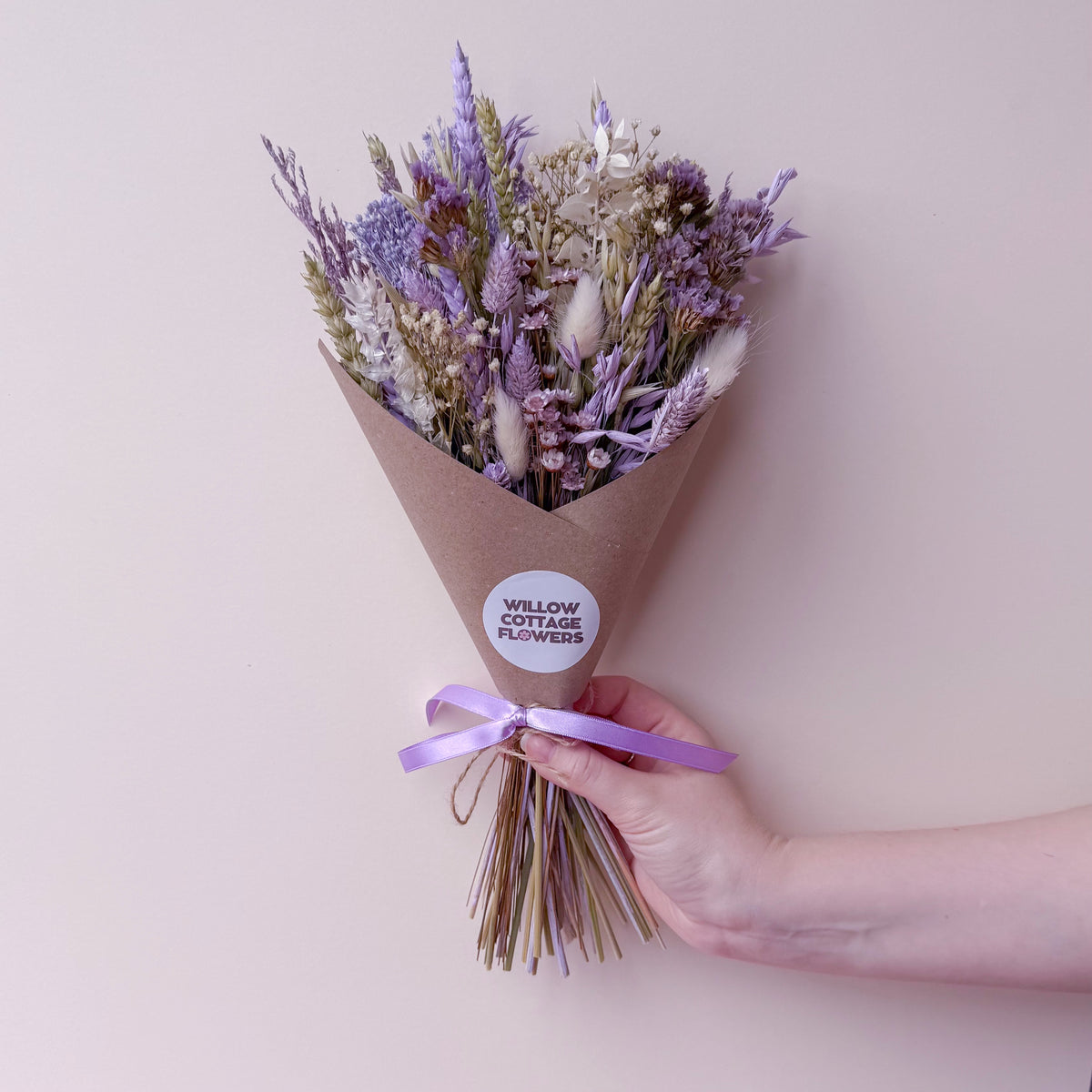 small flower girl bouquet in purple and sage green