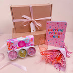 luxury gift hamper with tea lights, notebook. dried flowers and vase