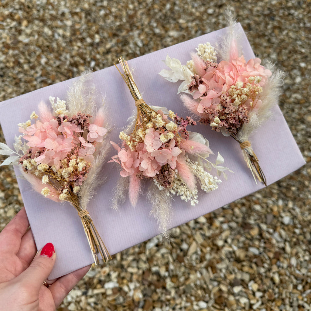 luxury pink hydrangea buttonhole with preserved babies breath and pampas grass