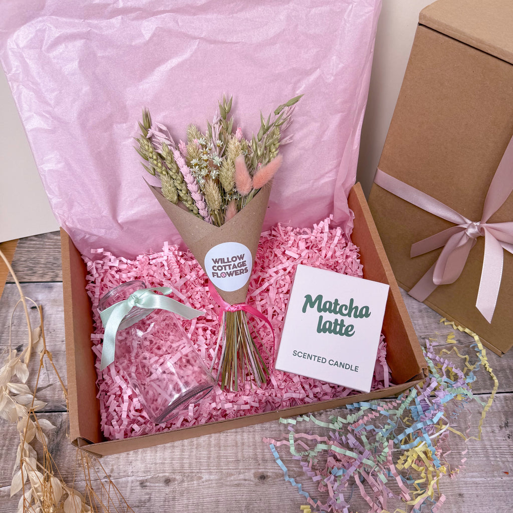 matcha latte themed gift box with green and pink dried flowers and glass vase with mint green ribbon