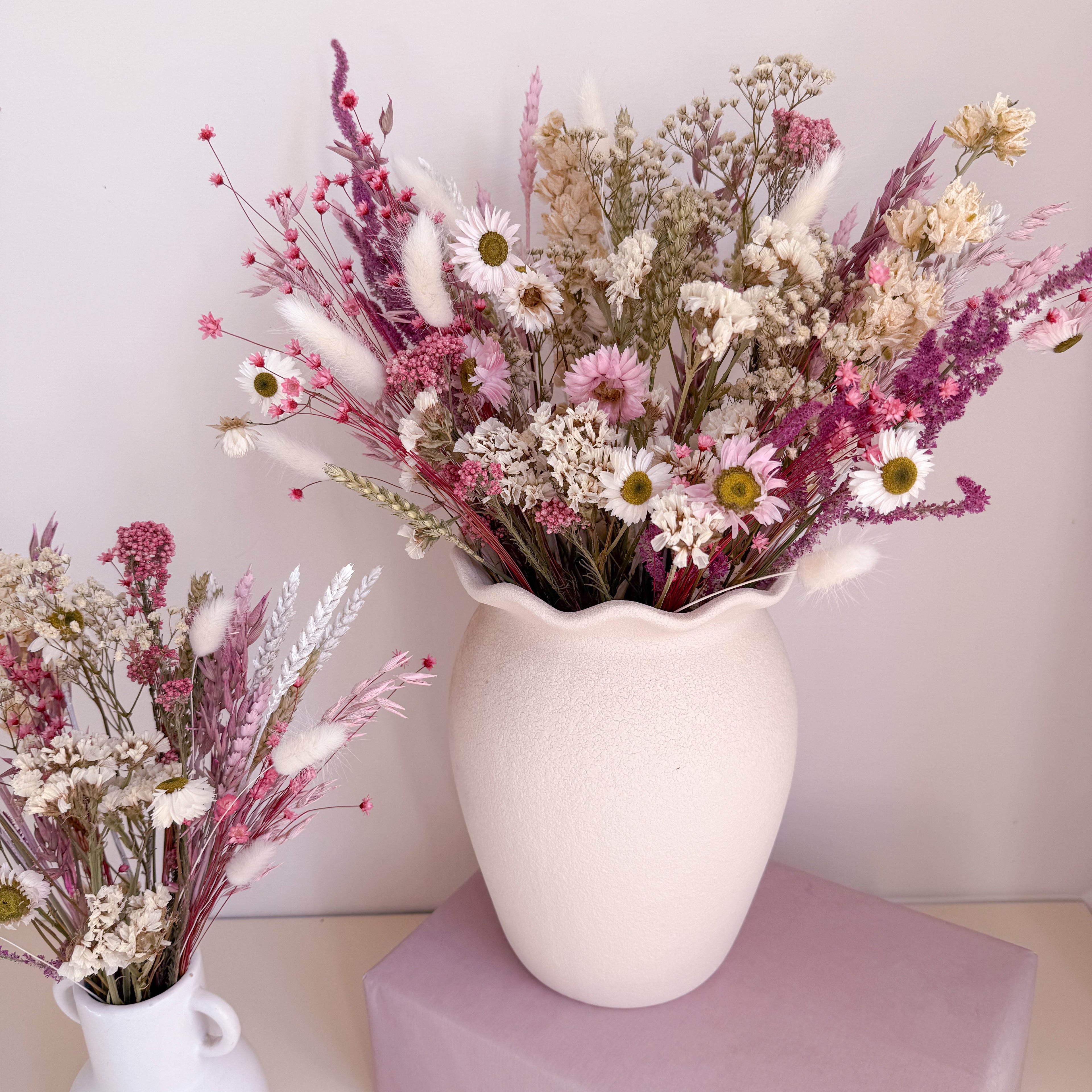 pink wildflower bouquet with daisies