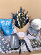 dark blue dried flower arrangement