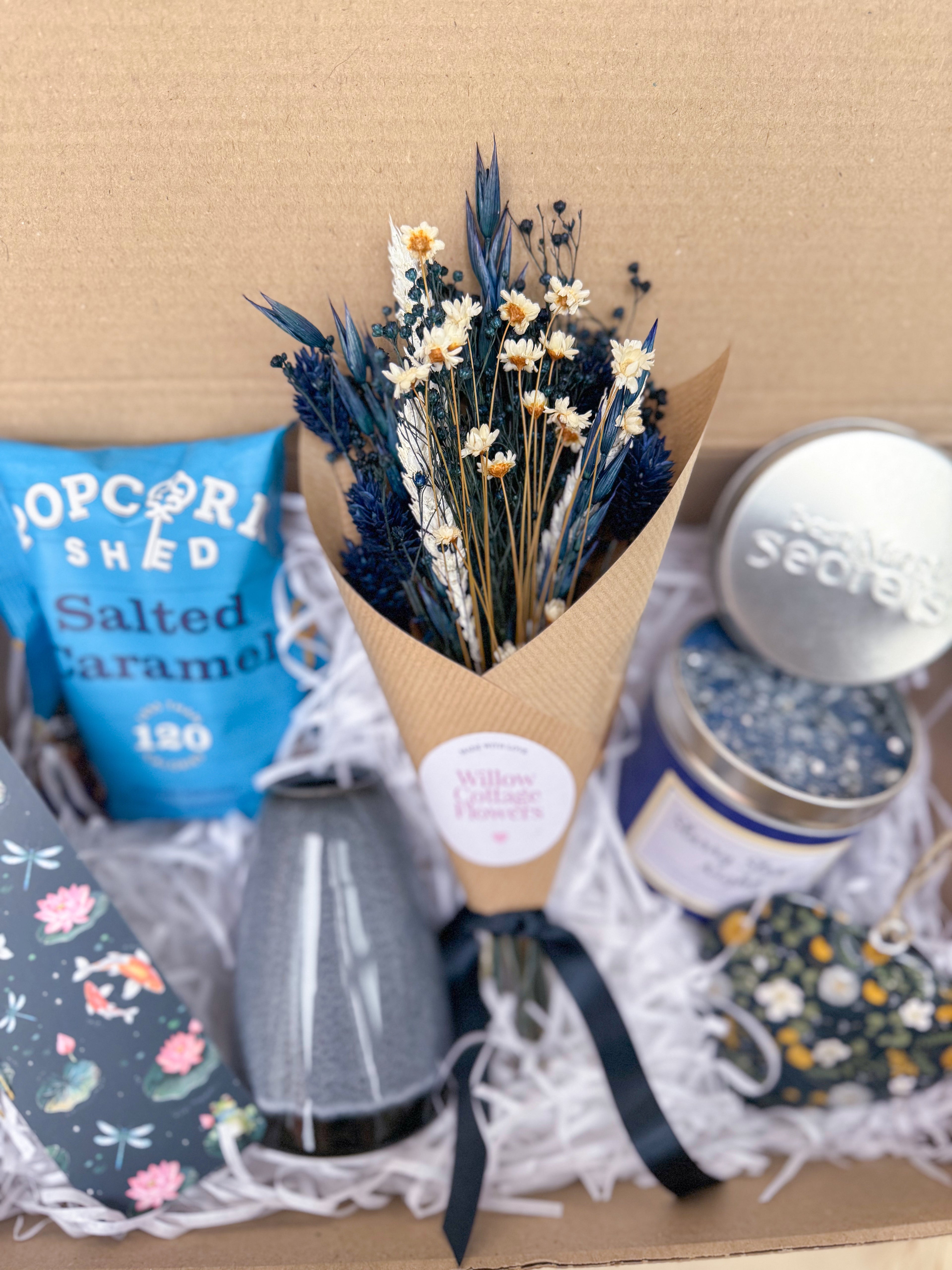 dark blue dried flower arrangement