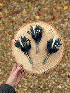 dark blue flower pin for groom