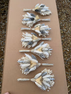 traditional floral buttonhole with silver