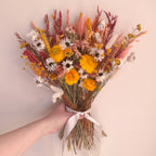 yellow dried daisy bouquet with wildflowers