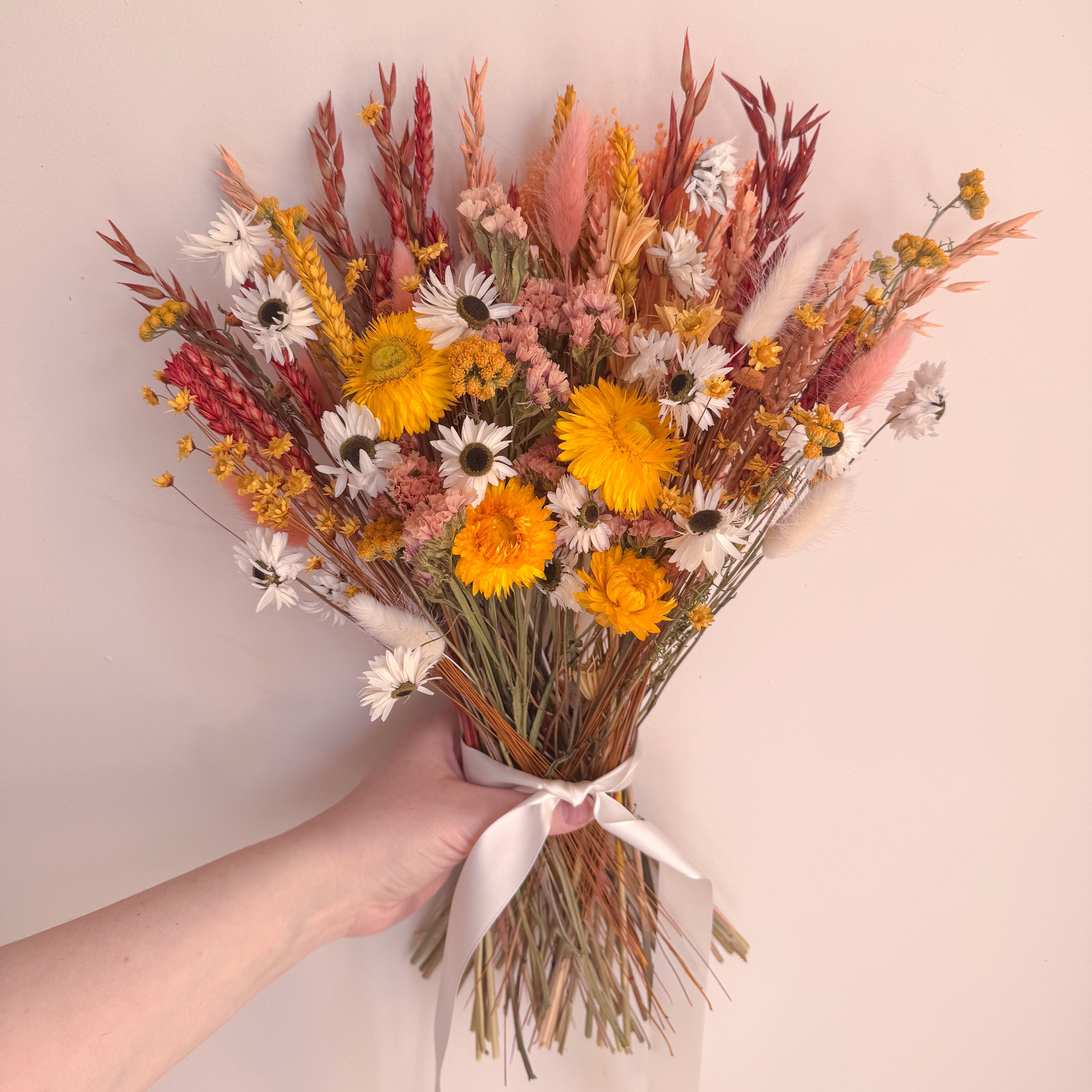 yellow dried daisy bouquet with wildflowers