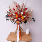 autumn dried floral arrangement with preserved eucalyptus
