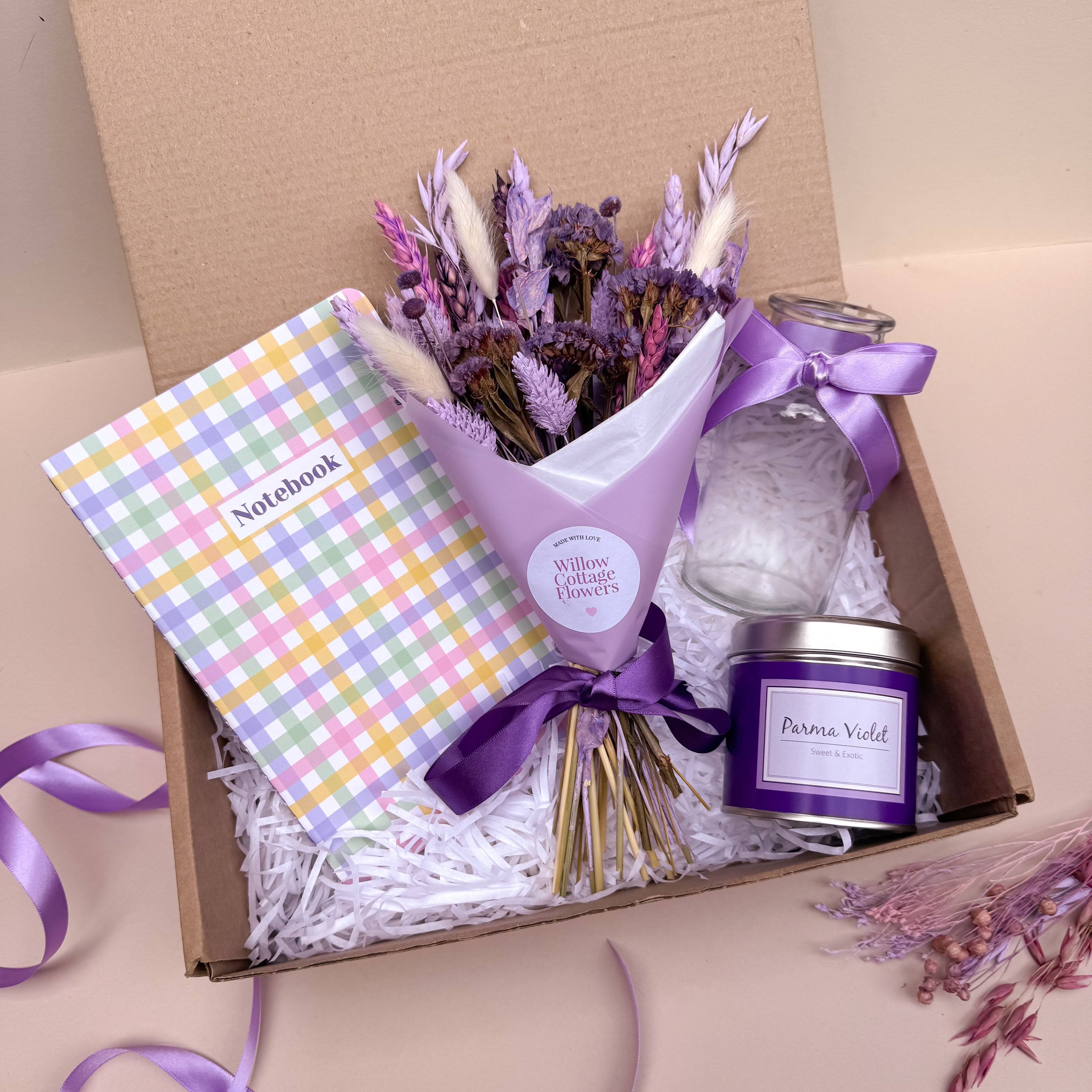 parma violet themed gift hamper with candle, notebook. dried flowers and vase