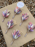 pink and purple floral buttonhole for wedding