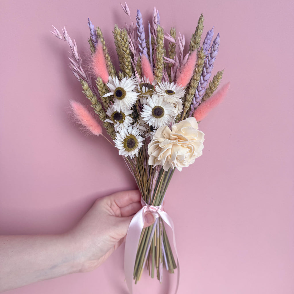 pastel dried flower bunch with wheat, daisies and bunny tails
