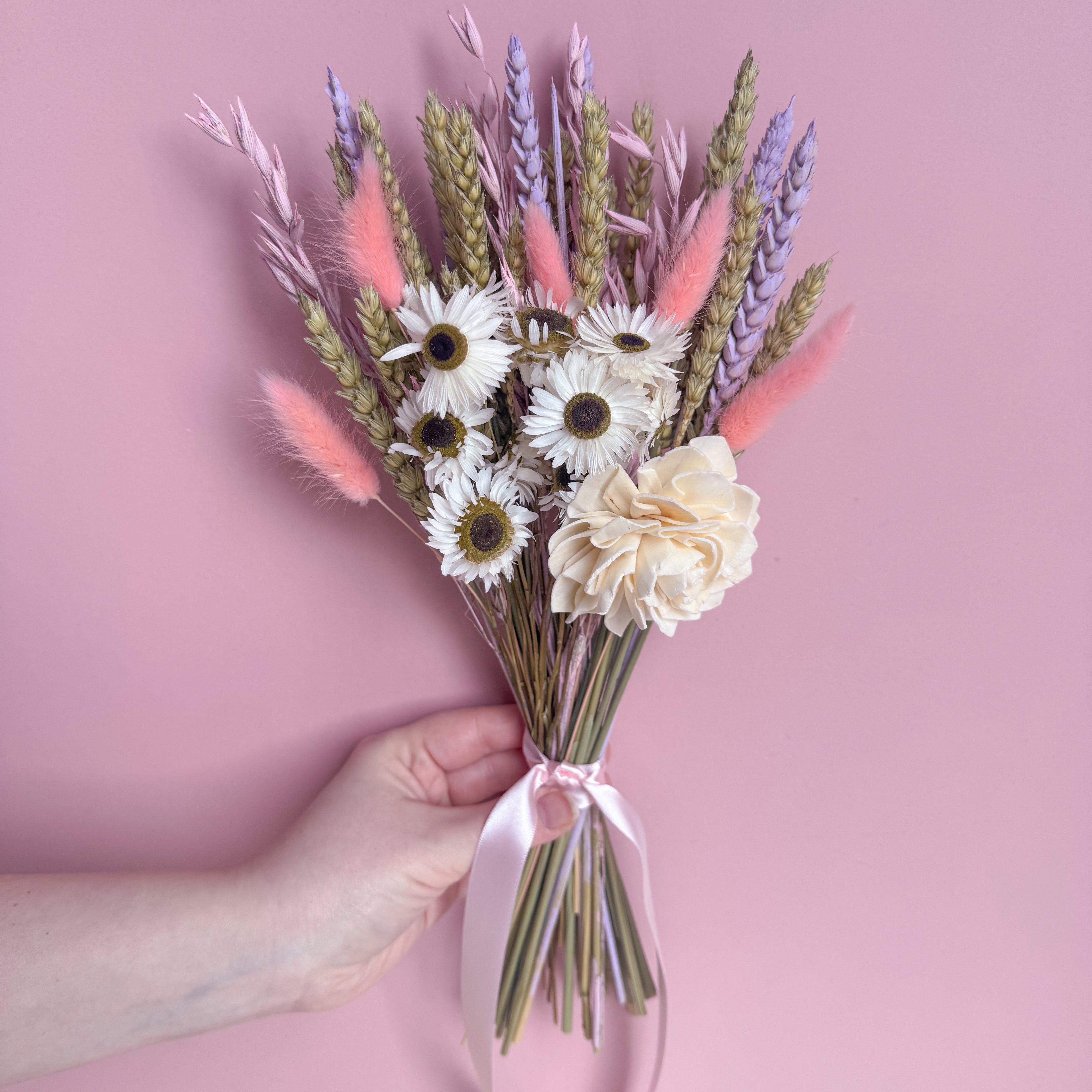 pastel dried flower bunch with wheat, daisies and bunny tails