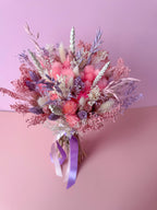 pink floral bouquet with bunny tails
