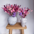 bold pink and purple dried flower arrangement
