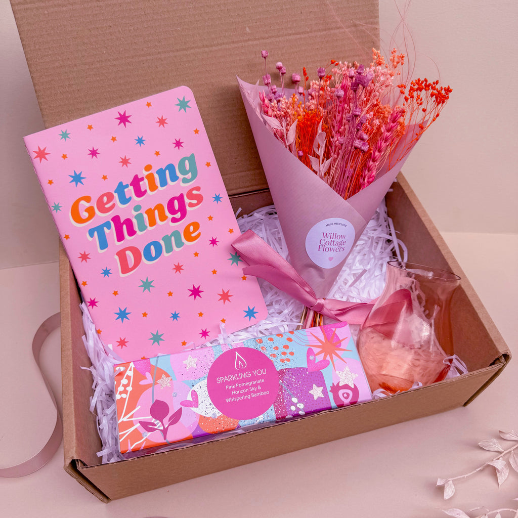 pink themed gift set for her with dried flowers and candles
