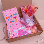 pink themed gift set for her with dried flowers and candles