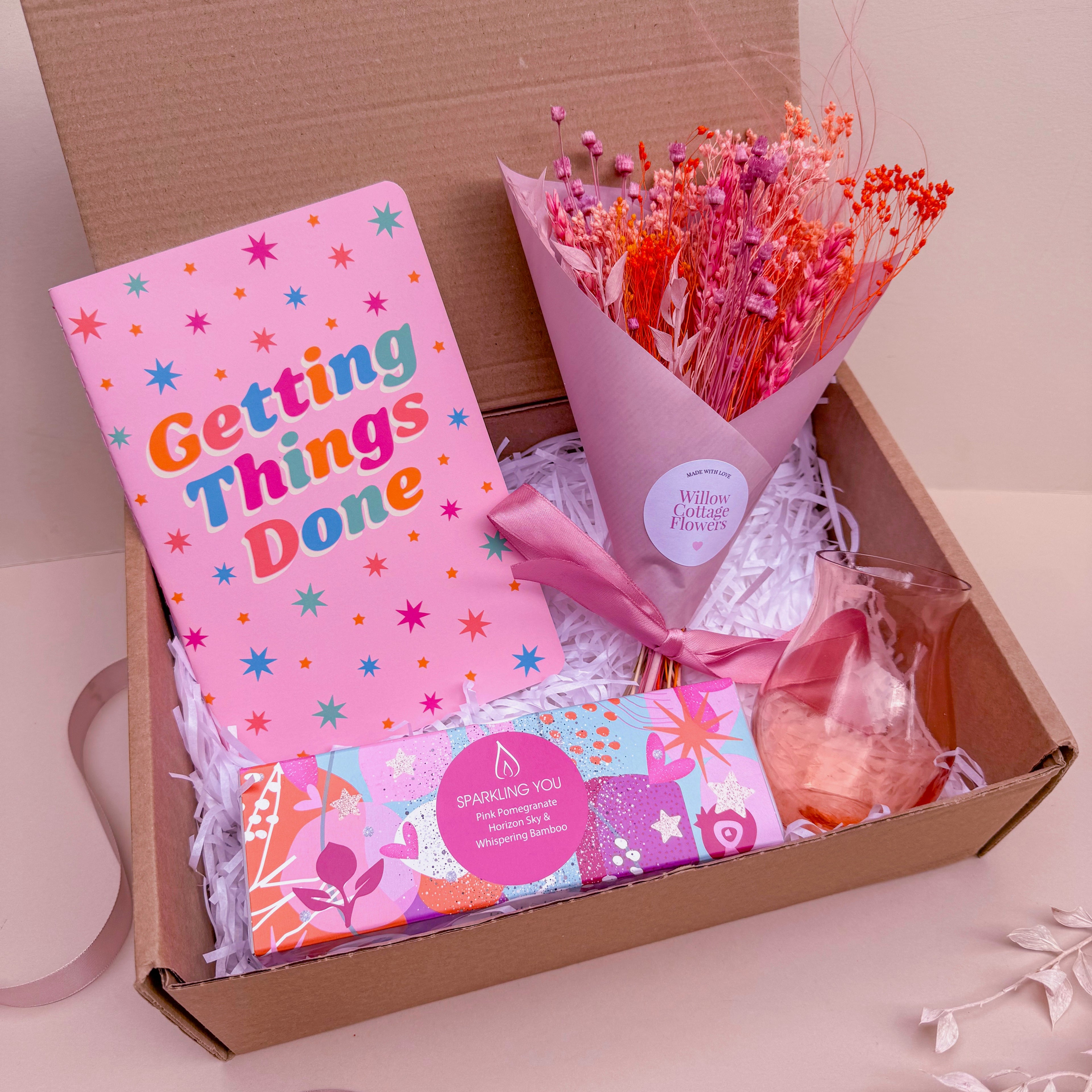pink themed gift set for her with dried flowers and candles