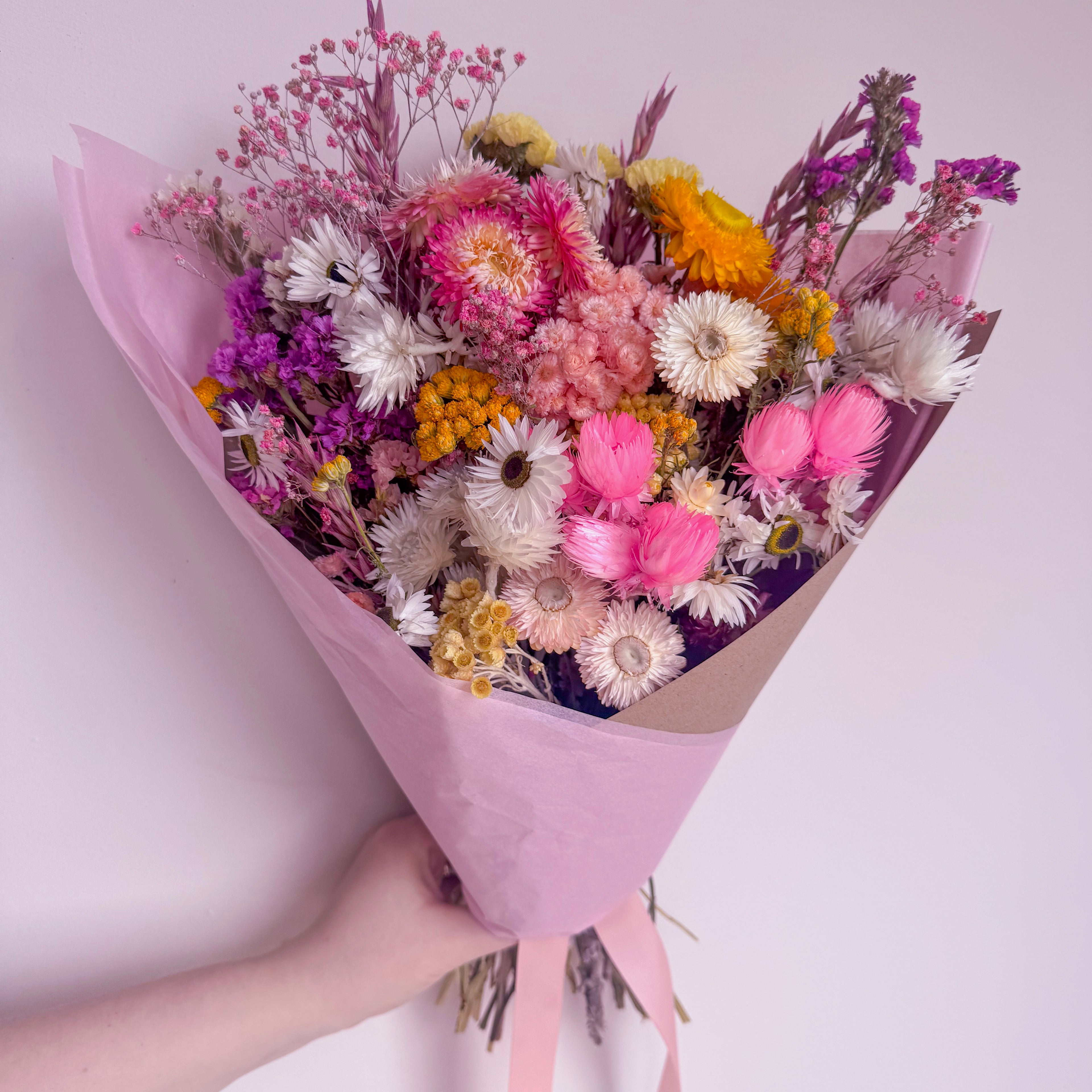 pink and yellow dried wildflower bouquet