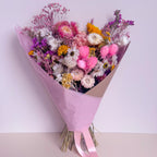 luxury wildflower bouquet with pink gift wrap