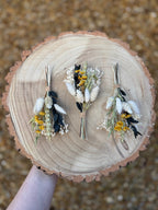preserved eucalyptus buttonhole with yellow and white dried flowers