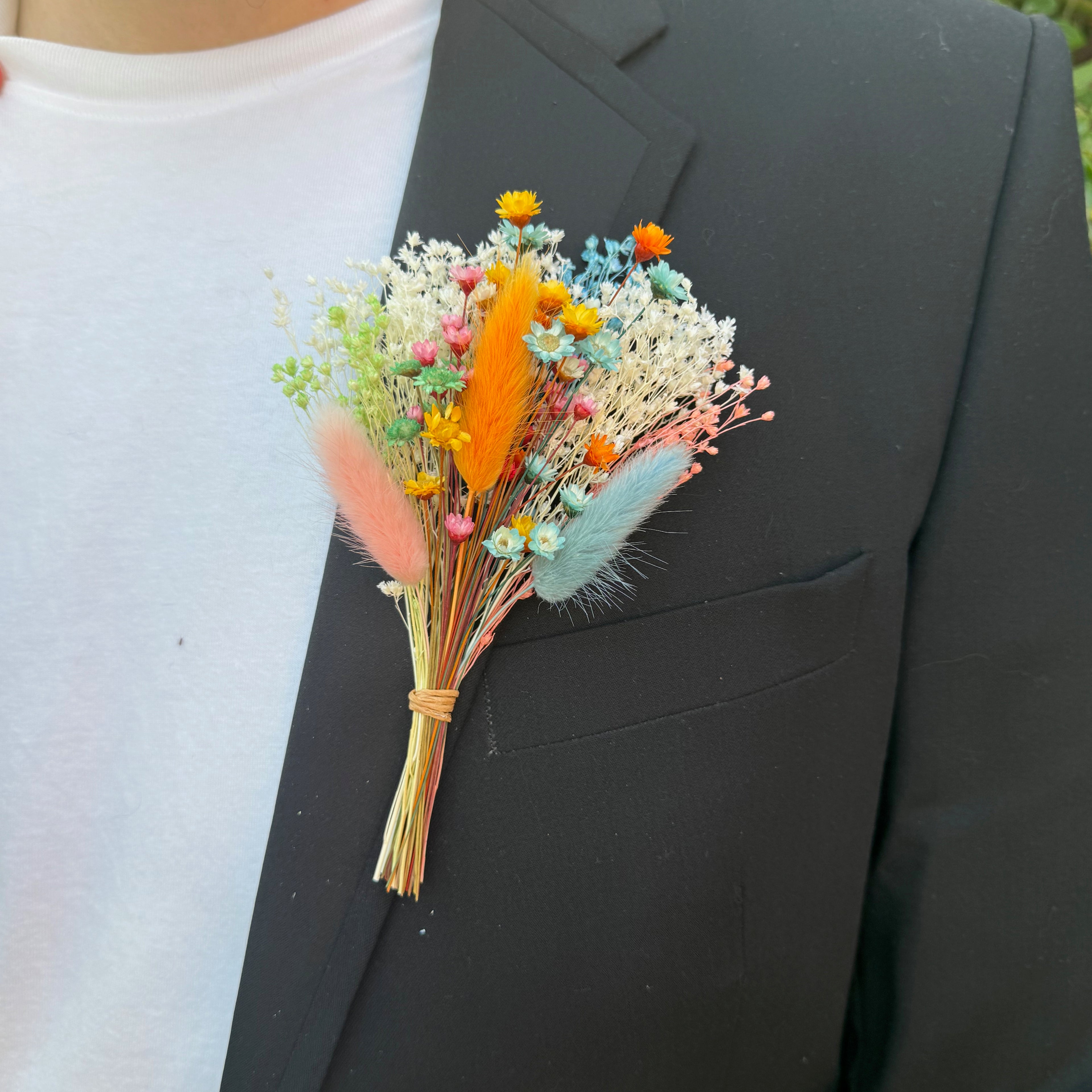 pastel rainbow dried flower buttonhole with bunny tails