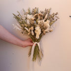 sage green bouquet with white ribbon