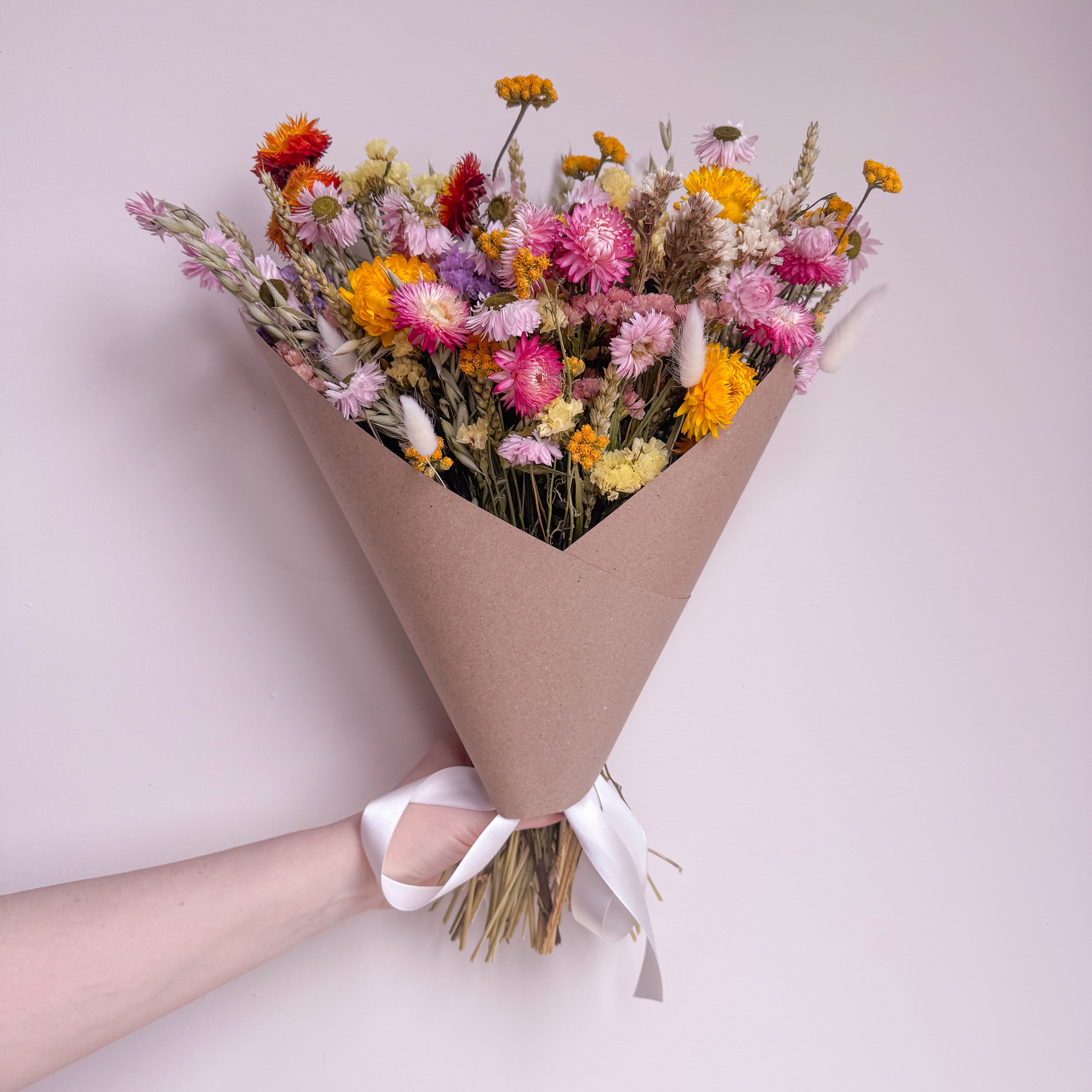 bright wildflower bouquet with daisies