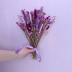 plum dried flower arrangement with statice and gypsophila